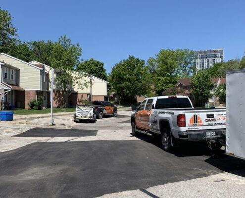 Image depicts the before of an asphalt sealing project in North York