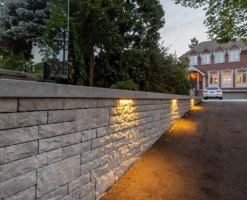 custom retaining with wall glass railings lighting