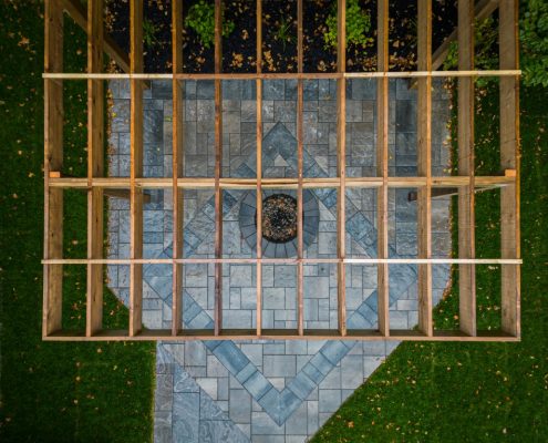 stone patio linked with pergola
