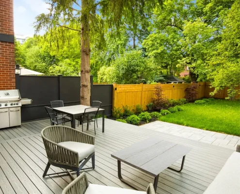 synthetic deck and stone walkway