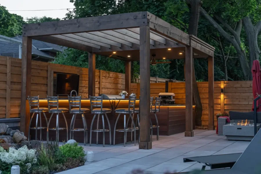 outdoor kitchen with stunning lounging area and interlocking