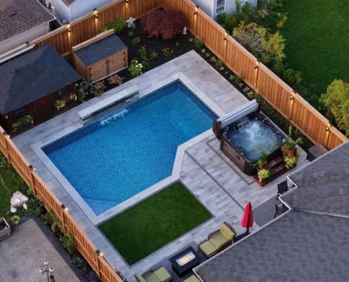 pool with waterfall and hot tub backyard redesign